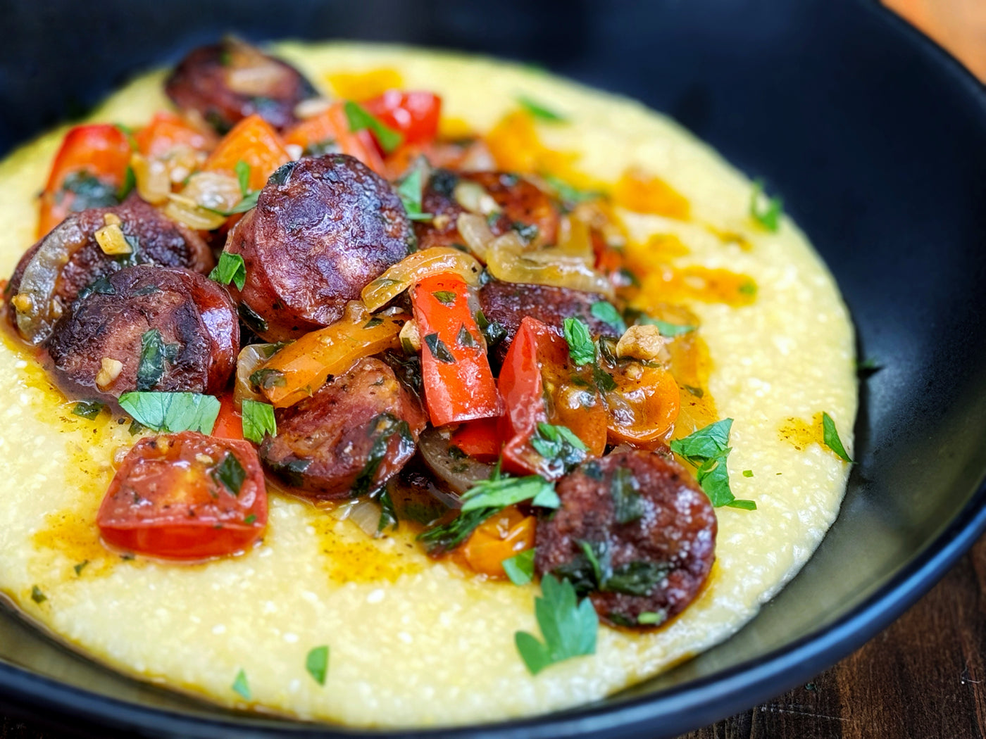 CAJUN SAUSAGE & PEPPER SKILLET WITH CREAMY GRITS