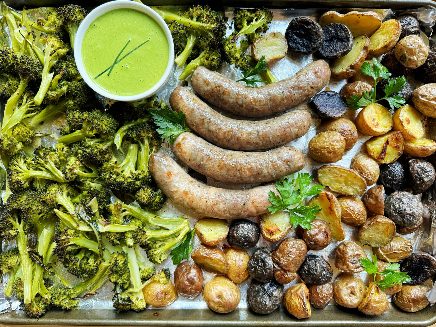 SHEET PAN SAUSAGE WITH BROCCOLINI & GREEN HERB SAUCE