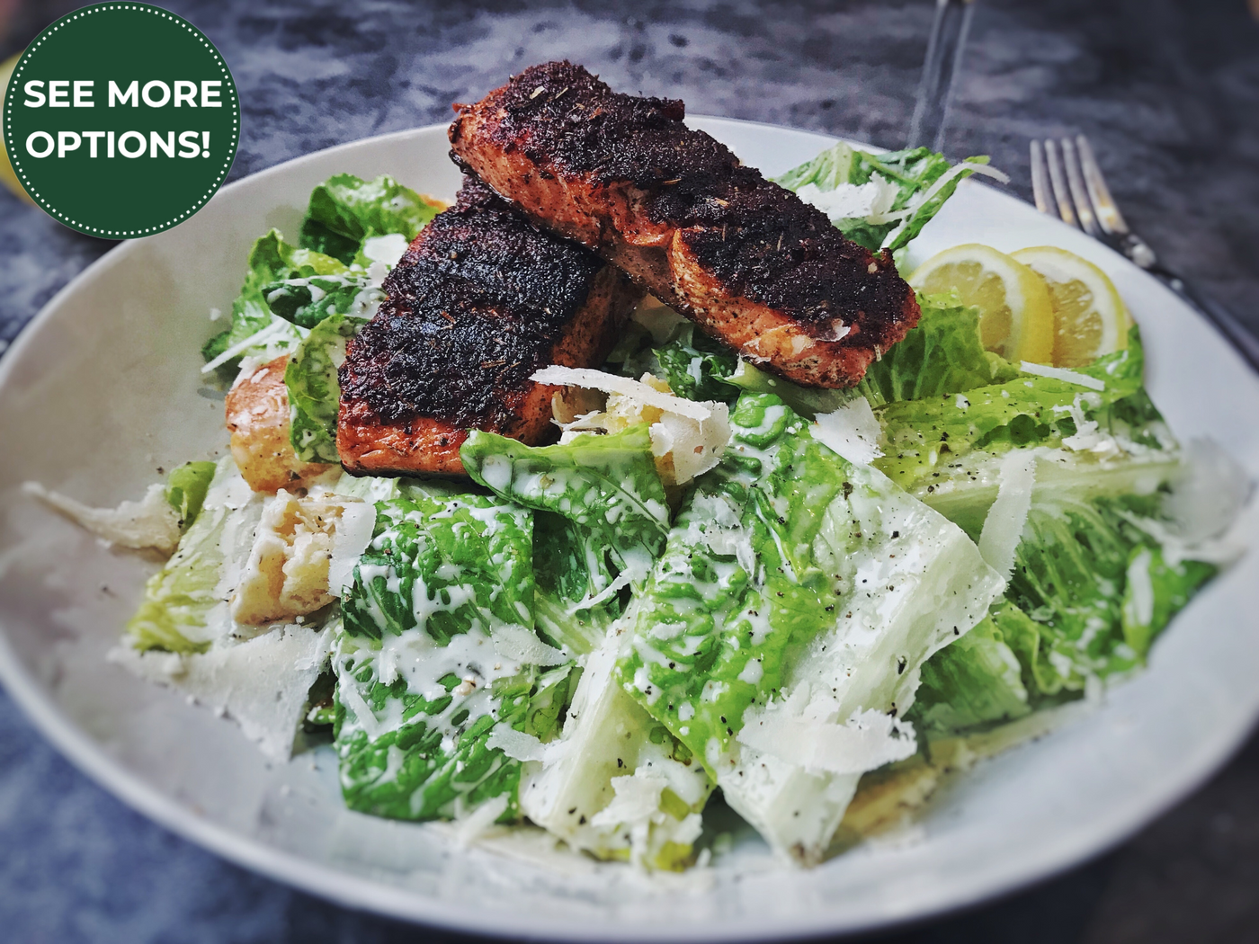 BLACKENED SALMON CAESAR WITH PECORINO + PEPPER CROUTONS