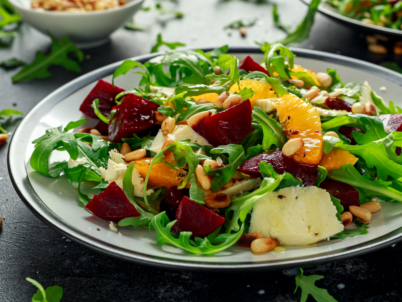 BEET + ORANGE SALAD WITH ARUGULA, GOAT CHEESE, + PINE NUTS